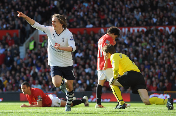 Luca Modric of Tottenham scores against Manchester United